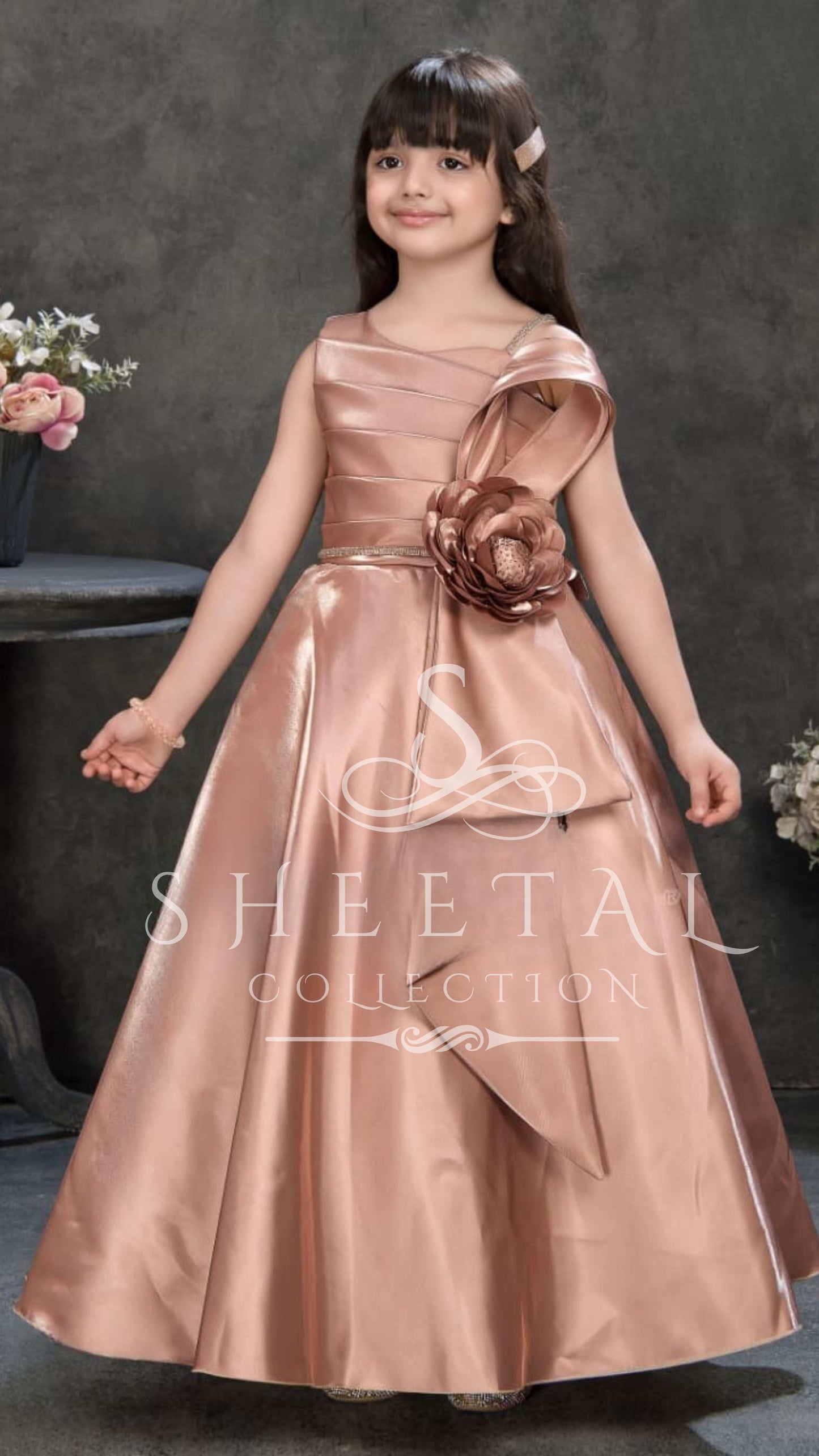 Rose Gold Satin Princess Gown with One-Shoulder Floral Accent – Sheetal Collection