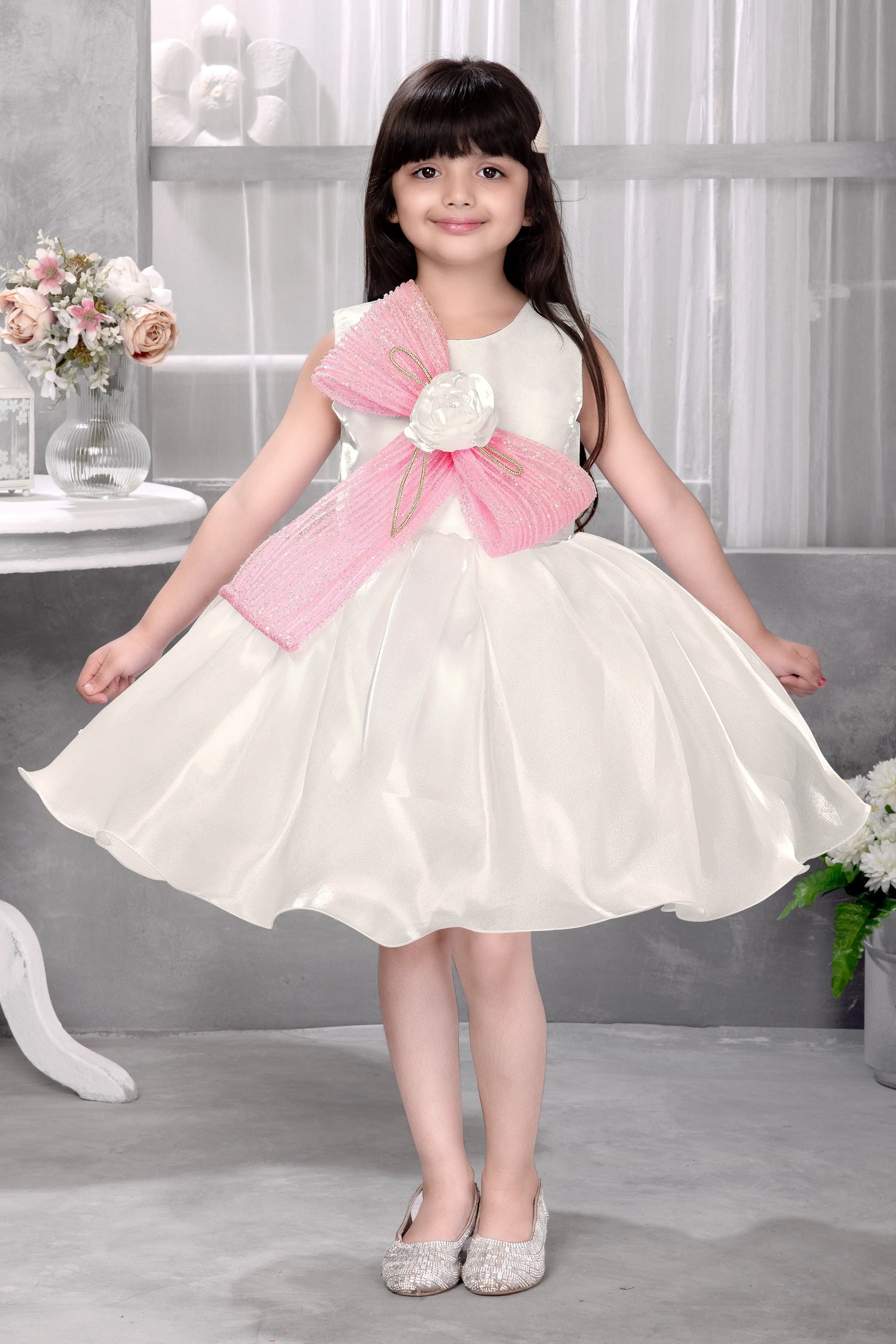 Off-White Satin Gown with Pink Shimmer Ruffle Sash for Girls   Tags